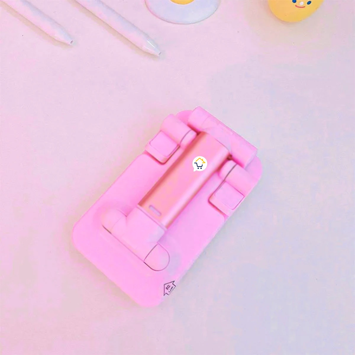 Set x2 soporte celular portátil rosado plegable con base ajustable en ángulo para escritorio.