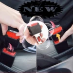 Extensor alargador de cinturón de seguridad de auto, metálico con botón rojo de presión.