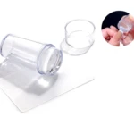 Set x2 sellos de silicona transparente para manicure con base y detalle de uso en uñas.
