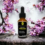 Serum facial Vital Age antiarrugas en frasco ámbar con gotero negro, rodeado de flores rosas.