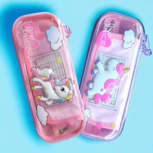 Cartuchera 3D unicornio rosa y morada con compartimento transparente para niños, ideal para útiles escolares.