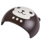 Lámpara UV LED para uñas en plástico ABS color café con diseño de cara de mono, forma semicircular, portátil y compacta para secado rápido en casa.