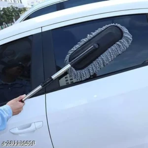 Cepillo telescópico gris para limpiar carrocería de autos blancos, mango extensible, plumas suaves.