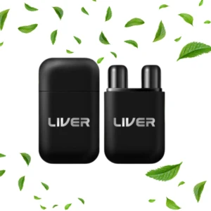 Desintoxicante nasal LIVER, dos unidades negras con cápsulas, rodeado de hojas verdes.
