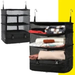 Estante de viaje colgante negro con 3 compartimentos de malla y base con cremallera, ideal para organizar ropa.