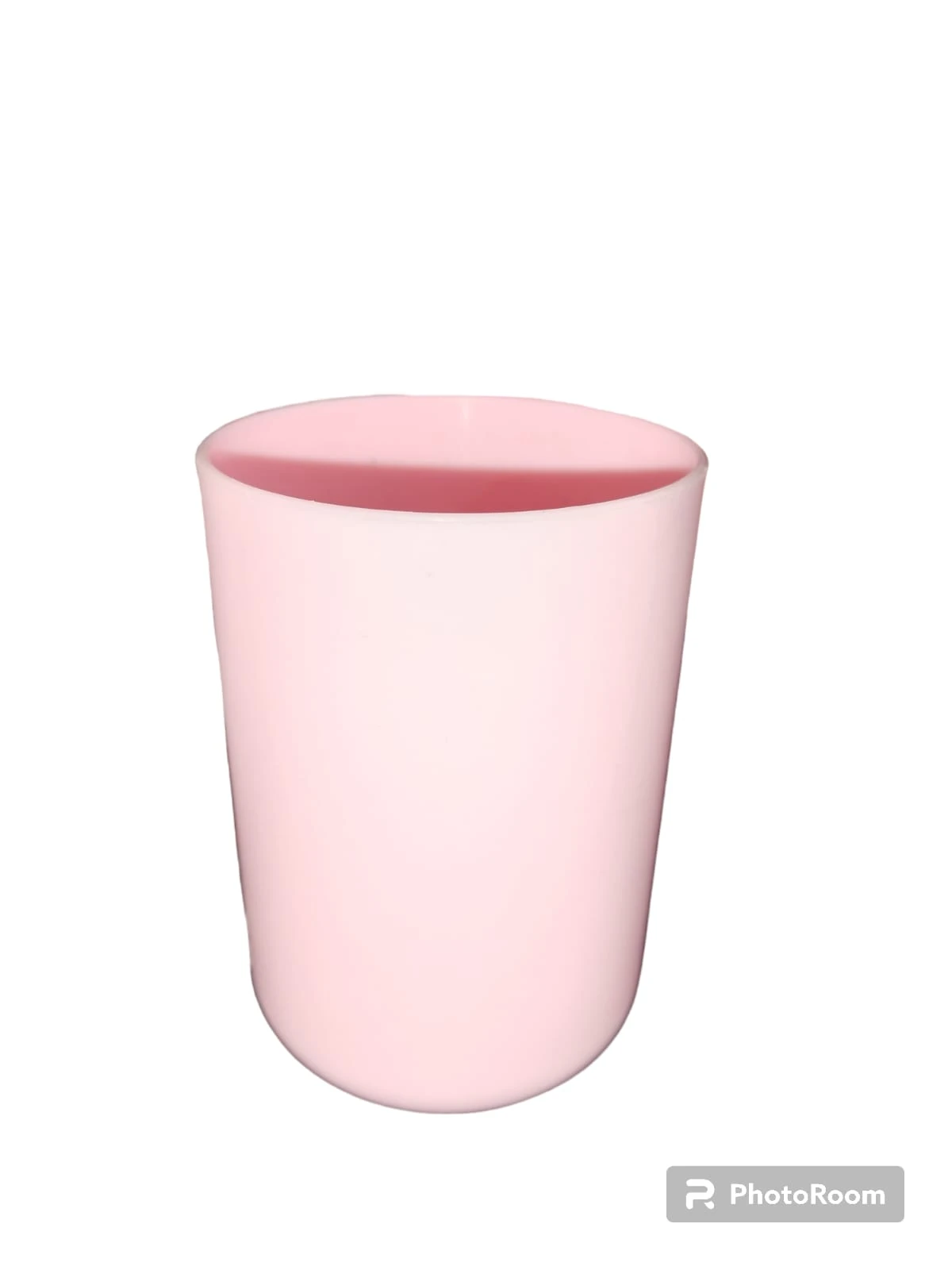 Vaso organizador de color rosa pastel con acabado liso, ideal para almacenar utensilios o accesorios de cocina de forma sencilla y minimalista.