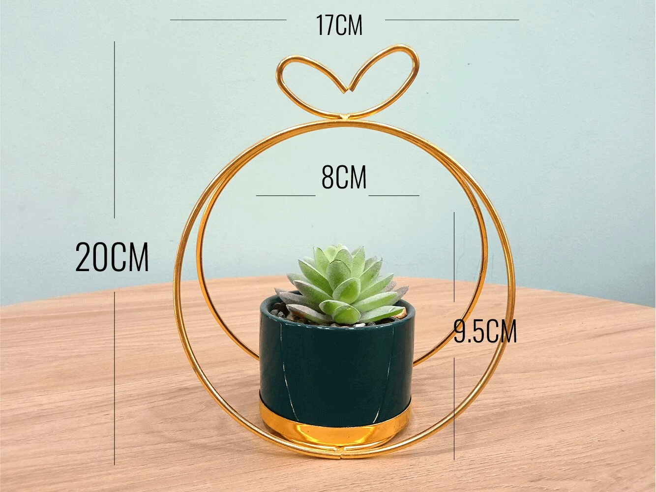 Suculenta artificial pequeña en maceta verde con marco dorado, 20cm alto.