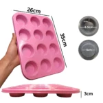 Molde para hornear 12 cavidades rosa antiadherente, dimensiones 35x26x3cm.