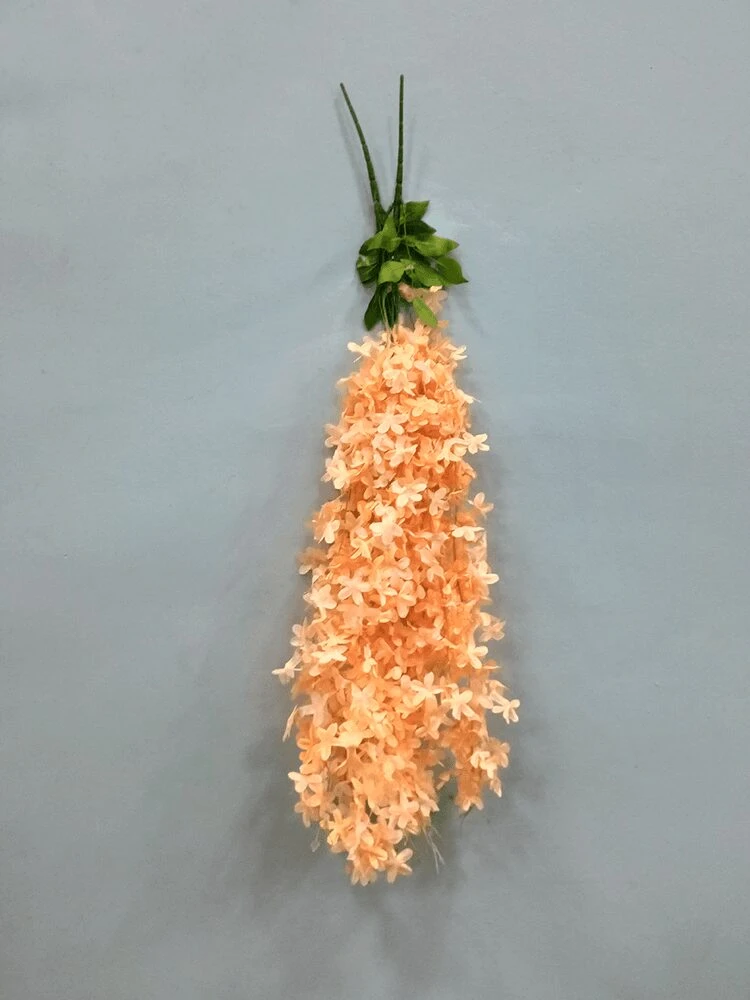 Mini glicinia artificial colgante color durazno, con tallos verdes, ideal para decoración.