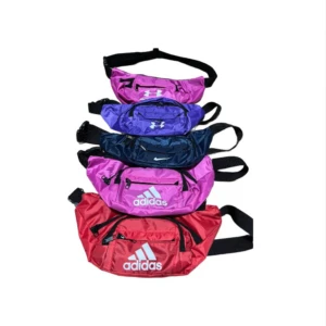 Canguros deportivos apilados: rosa con logo Under Armour, morado, azul marino, rosa y rojo con logo Adidas.
