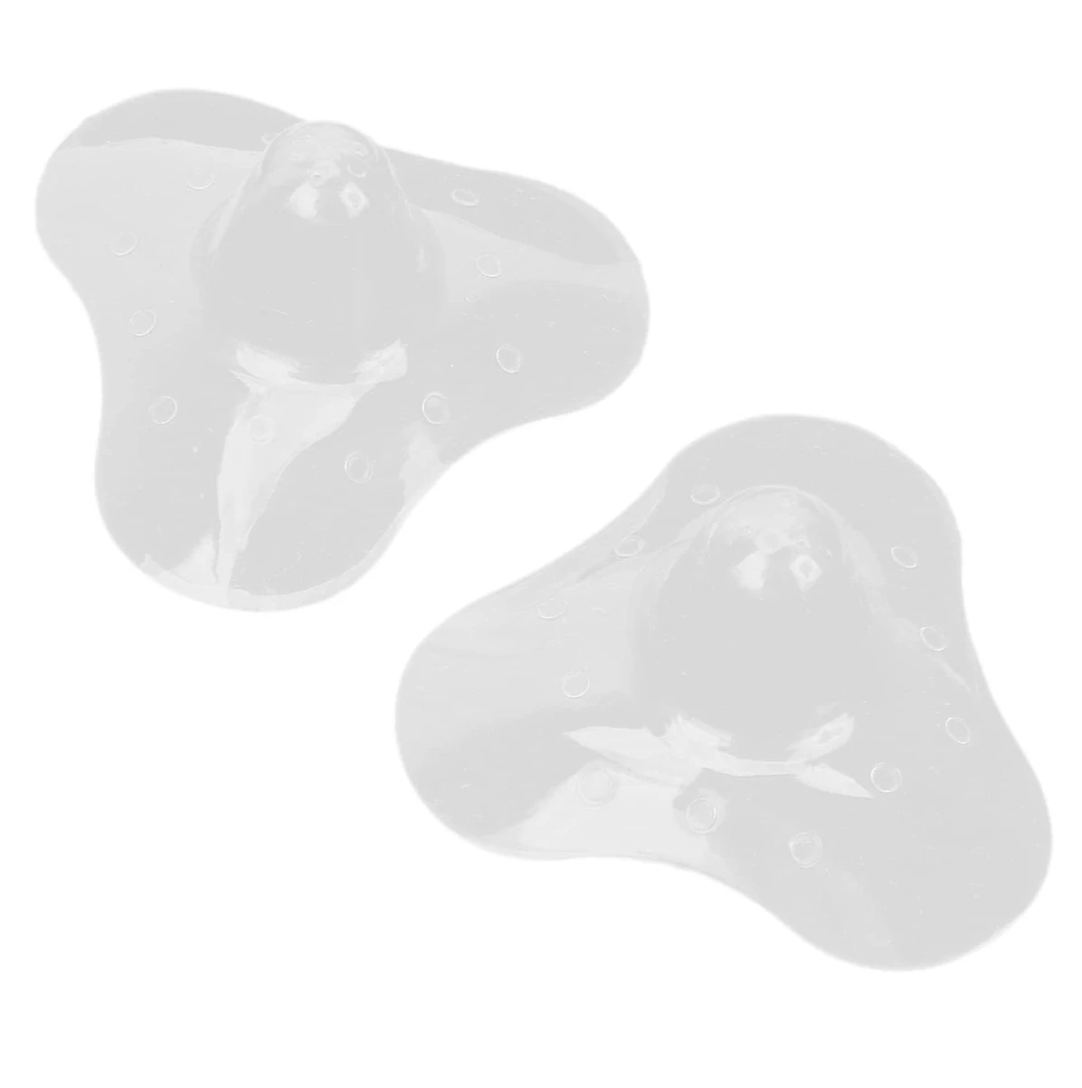 Dos pezoneras de lactancia en silicona transparente, con diseño ergonómico de tres alas y perforaciones, dispuestas sobre un fondo blanco.