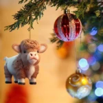 Colgante de vaquita de peluche marrón y blanco para árbol de Navidad.