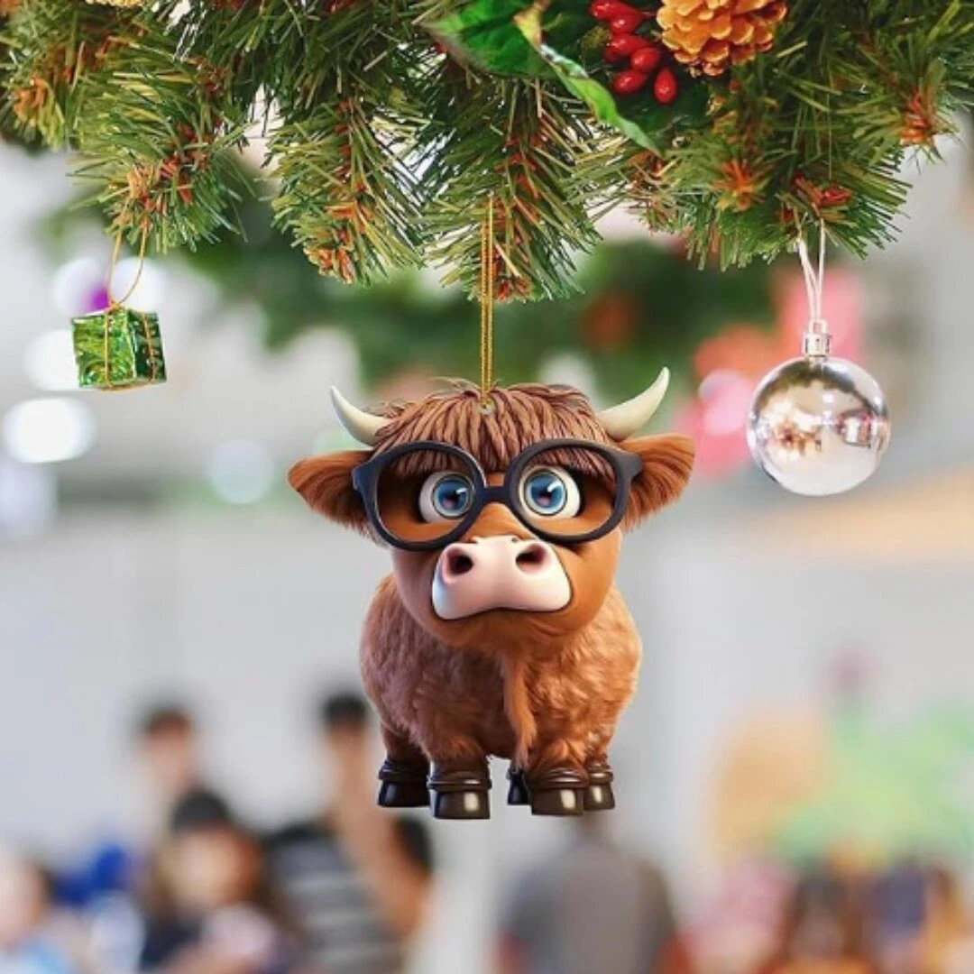 Colgante de vaquita con gafas, ideal para decorar árbol de Navidad.