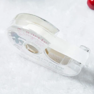 Cinta adhesiva doble faz transparente para ropa, en dispensador portátil.