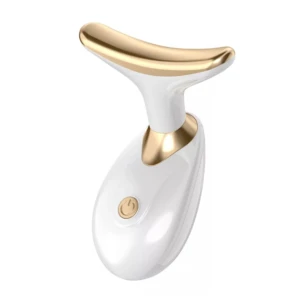 Máquina lifting facial blanca con detalles dorados, diseño ergonómico en forma de U y botón de encendido visible.