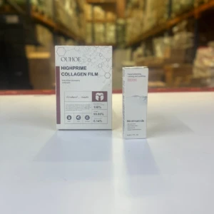 Caja de mascarillas de colágeno OUHOE y serum facial de nicotinamida, enfoque en el empaque y detalles de ingredientes.