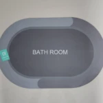 Tapete antideslizante gris para baño, diseño moderno, con texto "BATH ROOM".