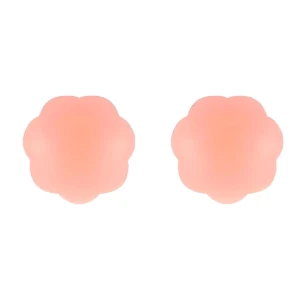 Par de cubre pezones de silicona color piel con diseño en forma de flor, superficie lisa y acabado mate para uso discreto bajo prendas ajustadas.