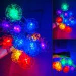 Cortina navideña de luces LED con 3 metros de flores transparentes multicolores, ideal para decoración festiva.