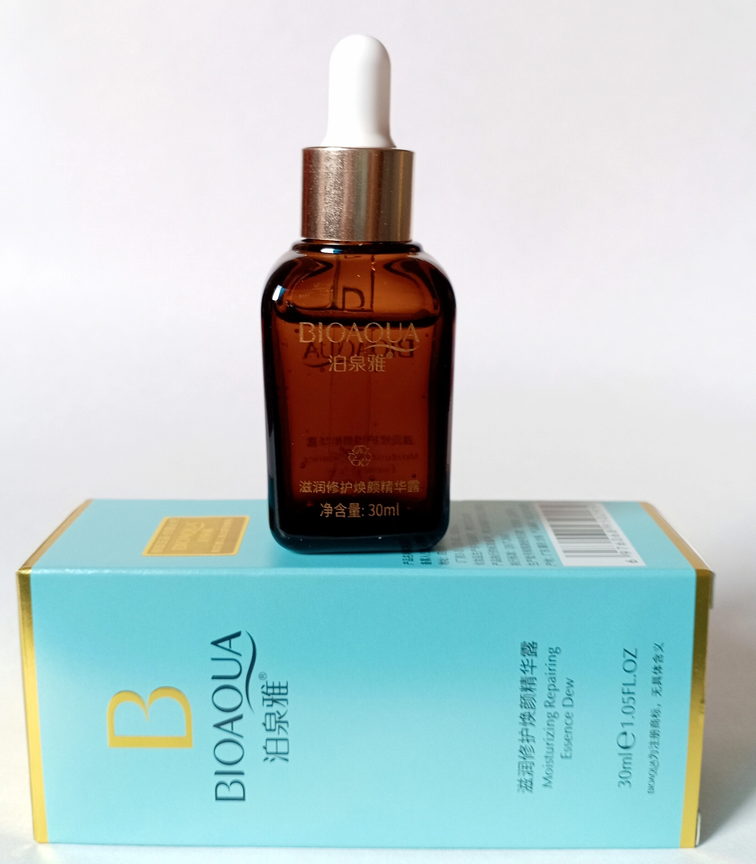 Serum facial BIOAQUA ámbar con gotero, en caja azul turquesa, 30ml.