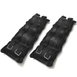 Dos pesas tobilleras negras de 5 kg con correas ajustables y detalles de tela.