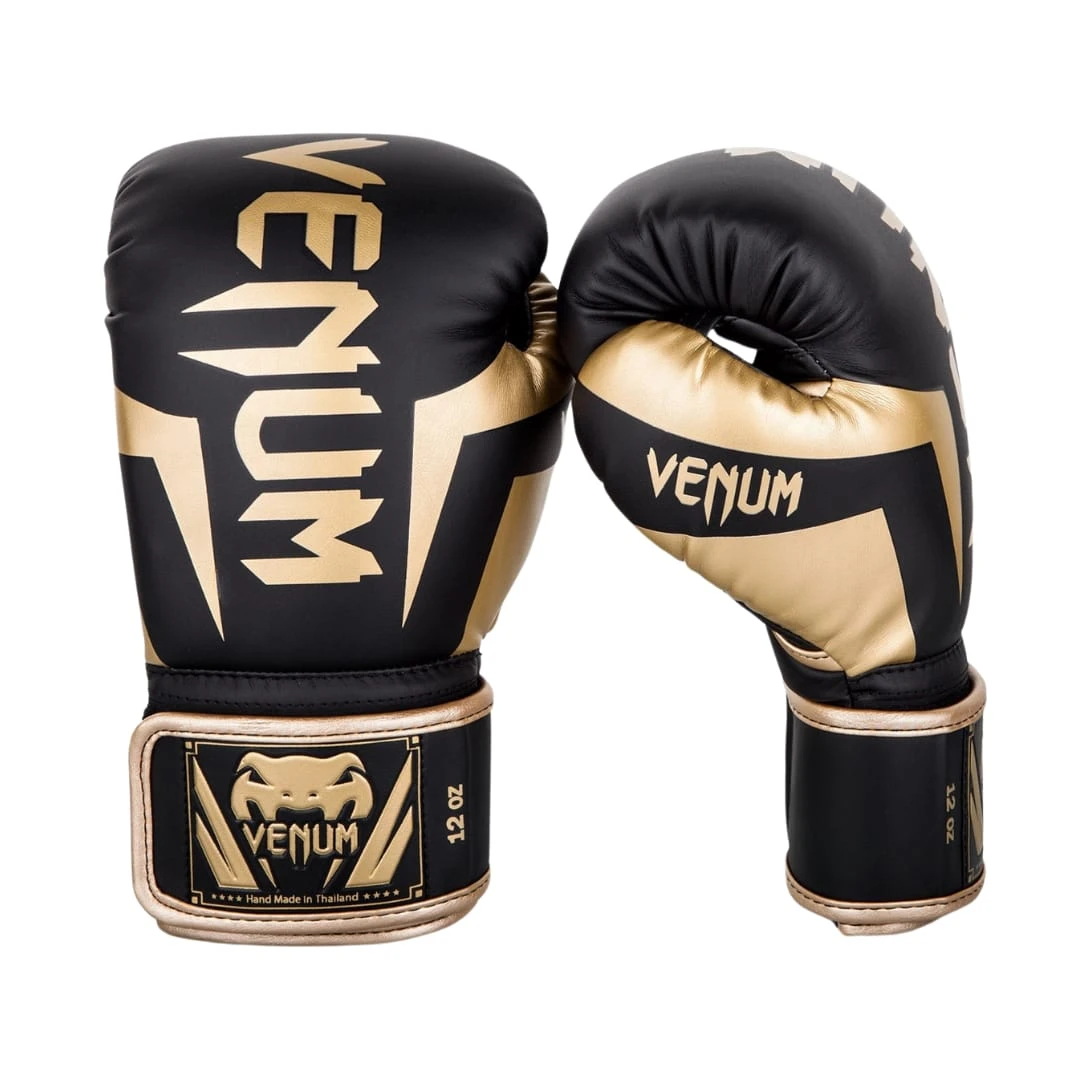 Guantes de boxeo Venum 12oz negros y dorados, diseño tribal, hechos en Tailandia.