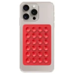 Funda transparente para iPhone con accesorio rojo adherente de múltiples ventosas para soporte.