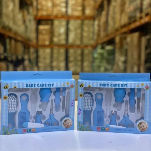 Set azul para cuidado de bebés con cepillo, peine, cortaúñas, tijeras y más.