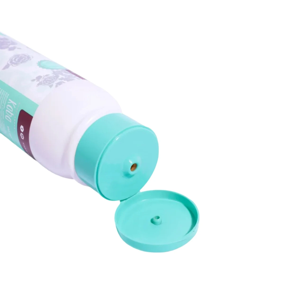 Bio Mascarilla Capilar Kaba, envase blanco con tapa turquesa abierta, mostrando dispensador.