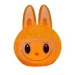 Lámpara de mesa kawaii con forma de cabeza de conejo, acabado en color naranja escarchado con textura brillante y luz LED interna integrada.