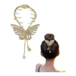 Pinza dorada con mariposa de pedrería y perlas, ideal para coletas y peinados elegantes.