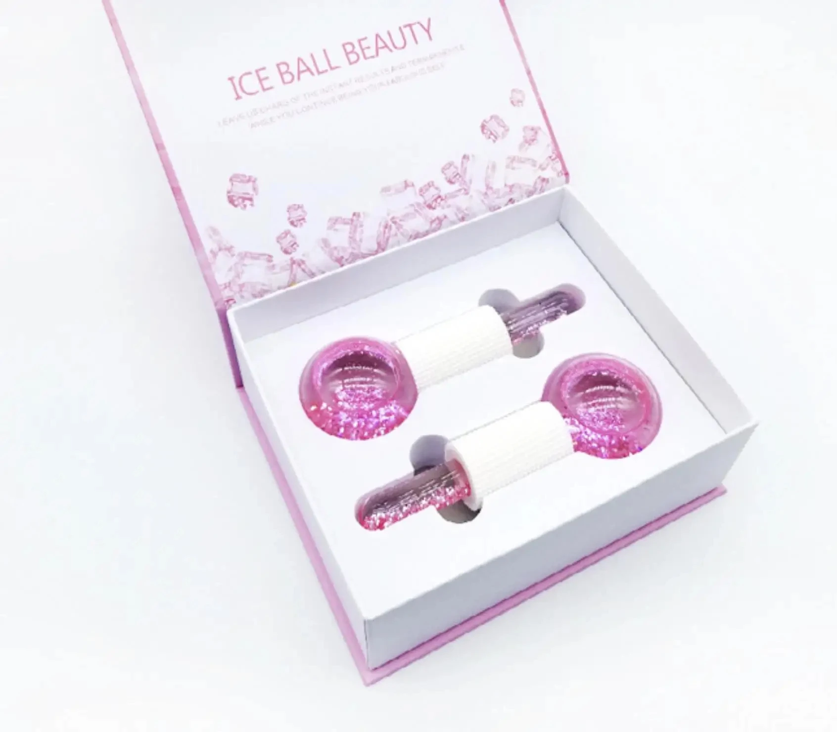 Set x2 masajeadores faciales de hielo para belleza, con esferas rosas y líquido brillante, en caja de regalo.