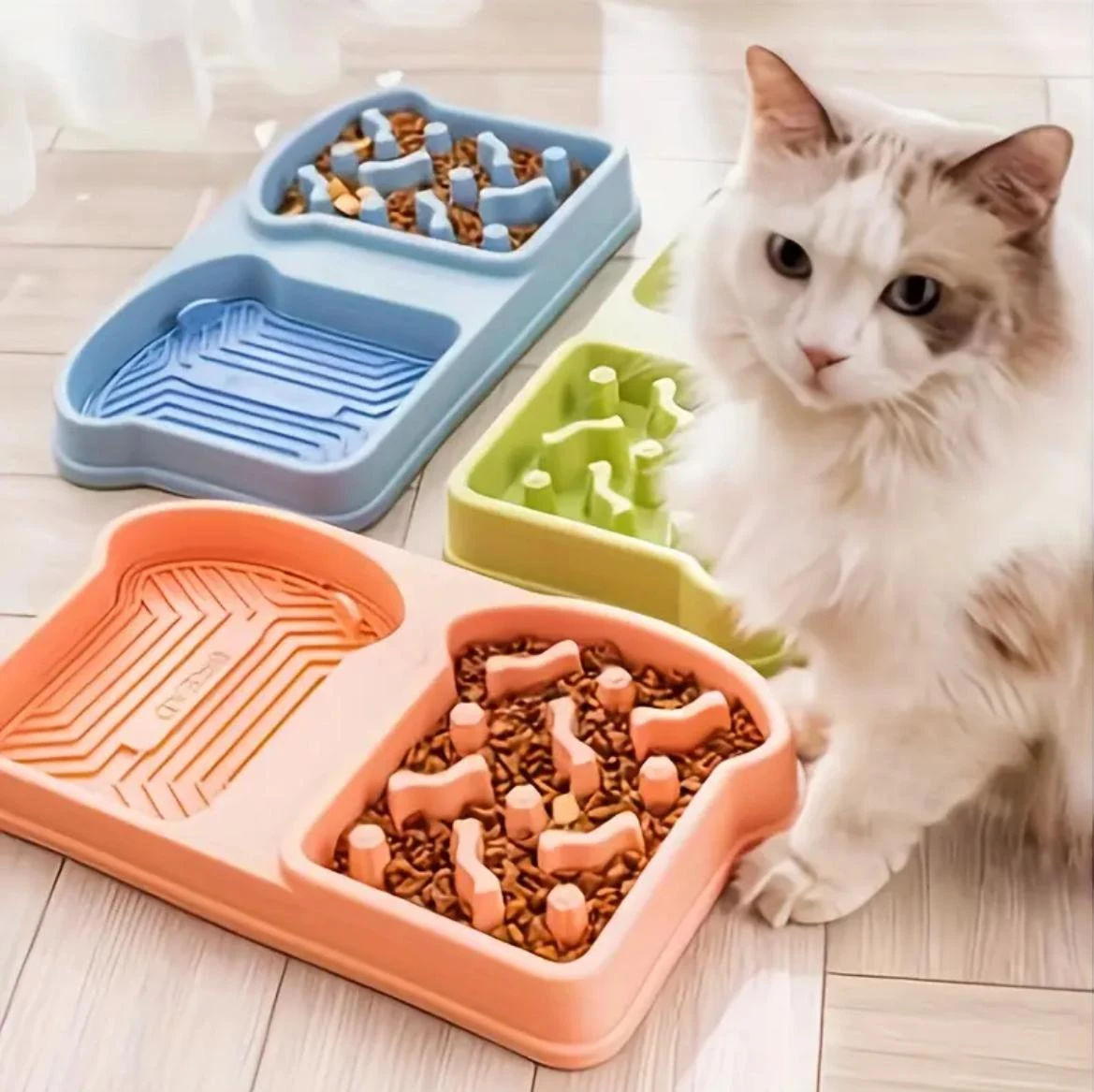 Plato antiahogo y bebedero para mascota en tonos pastel con divisor para comida y agua.