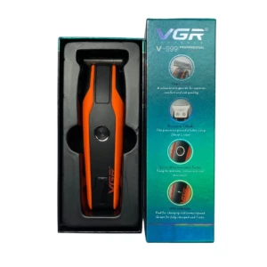 Recortadora VGR V-999 naranja y negra con cuchilla de acero inoxidable, ideal para cortes precisos.
