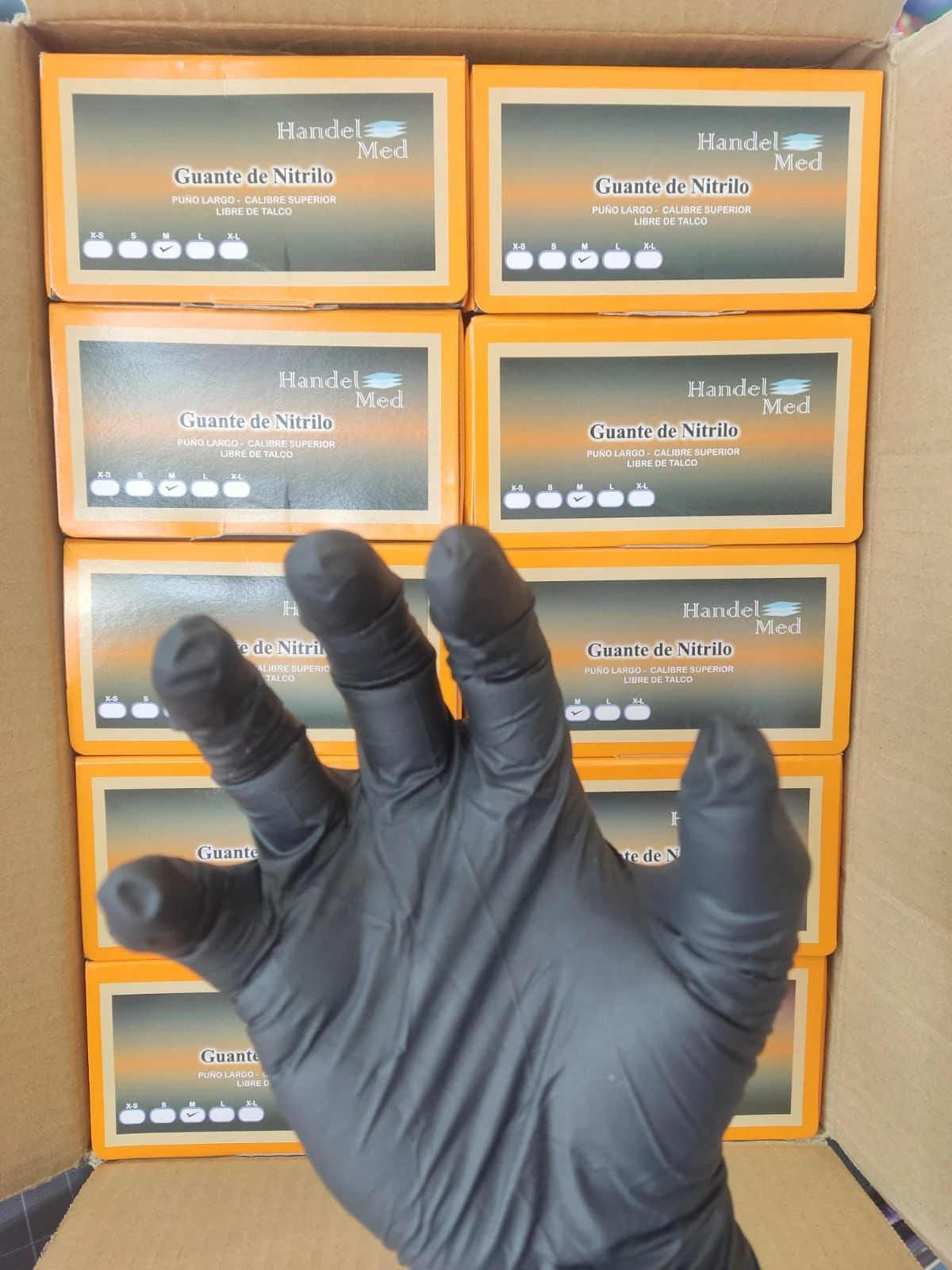 Guantes de nitrilo negros para examen médico, talla M, presentados en caja.