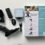 Kit de video AY-49 negro con trípode, micrófono y luz LED para transmisiones en vivo.