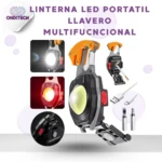 Linterna LED portátil llavero multifuncional gris con clip naranja, luz blanca y roja, incluye cable USB y puntas.