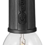 Lámpara LED de camping negra tipo bombilla transparente, recargable con gancho y puerto USB.