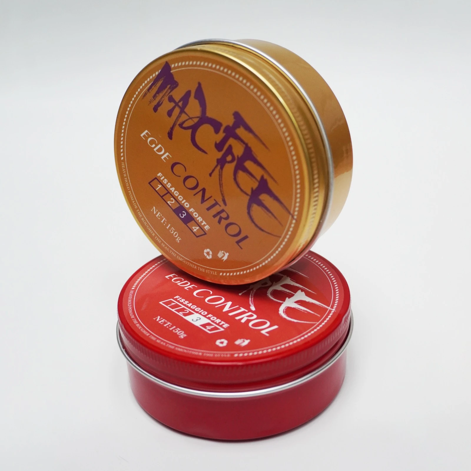 Dos latas redondas de cera para el cabello Edge Control de 150g, una dorada sobre otra roja, con diseño apilado sobre fondo blanco.