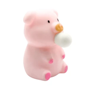Cerdo rosado de silicona sentado con bola blanca en la boca, juguete antiestrés