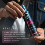 Manos sostienen un envase cilíndrico de suero capilar L3VEL3 de 200 ml, con etiqueta negra y letras rosadas que detalla beneficios de suavidad y brillo.