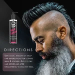 Suero capilar L3VEL3 con aloe vera de 200 ml junto a perfil de hombre con corte mohicano y barba larga, resaltando brillo y control de frizz en su cabello.