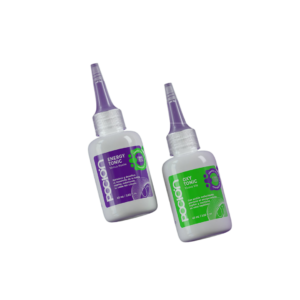 Dos envases de 60 ml con aplicador tipo punta: Energy Tonic morado para noche y Oxy Tonic verde para día, especializados en fortalecimiento capilar.