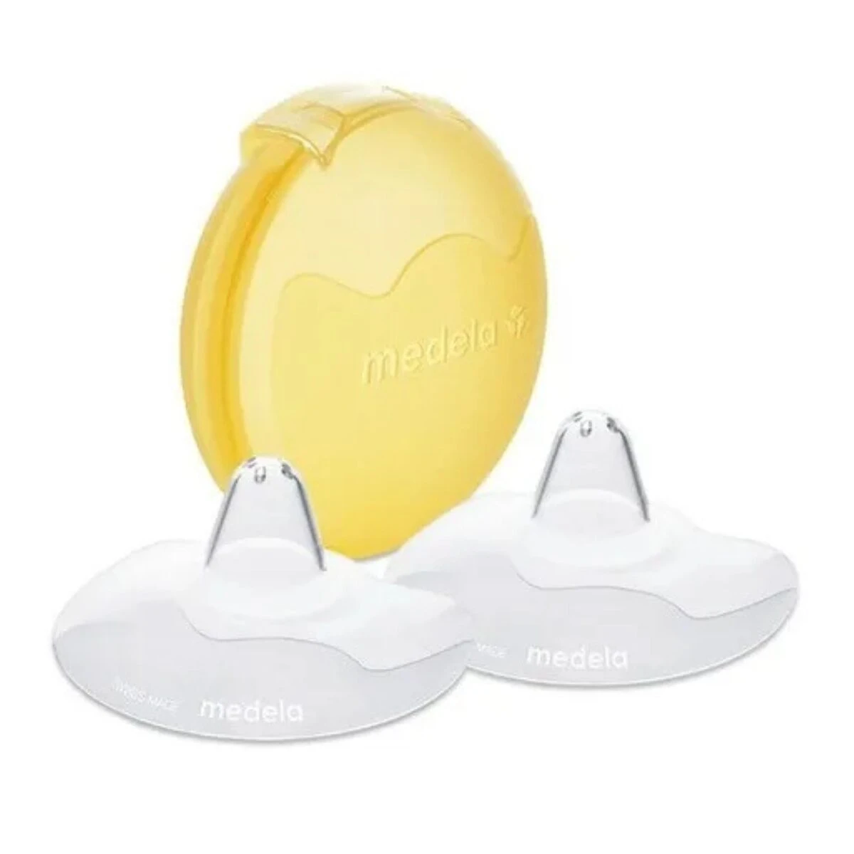 Pezoneras Medela de silicona, dos unidades blancas, con cubierta protectora amarilla.