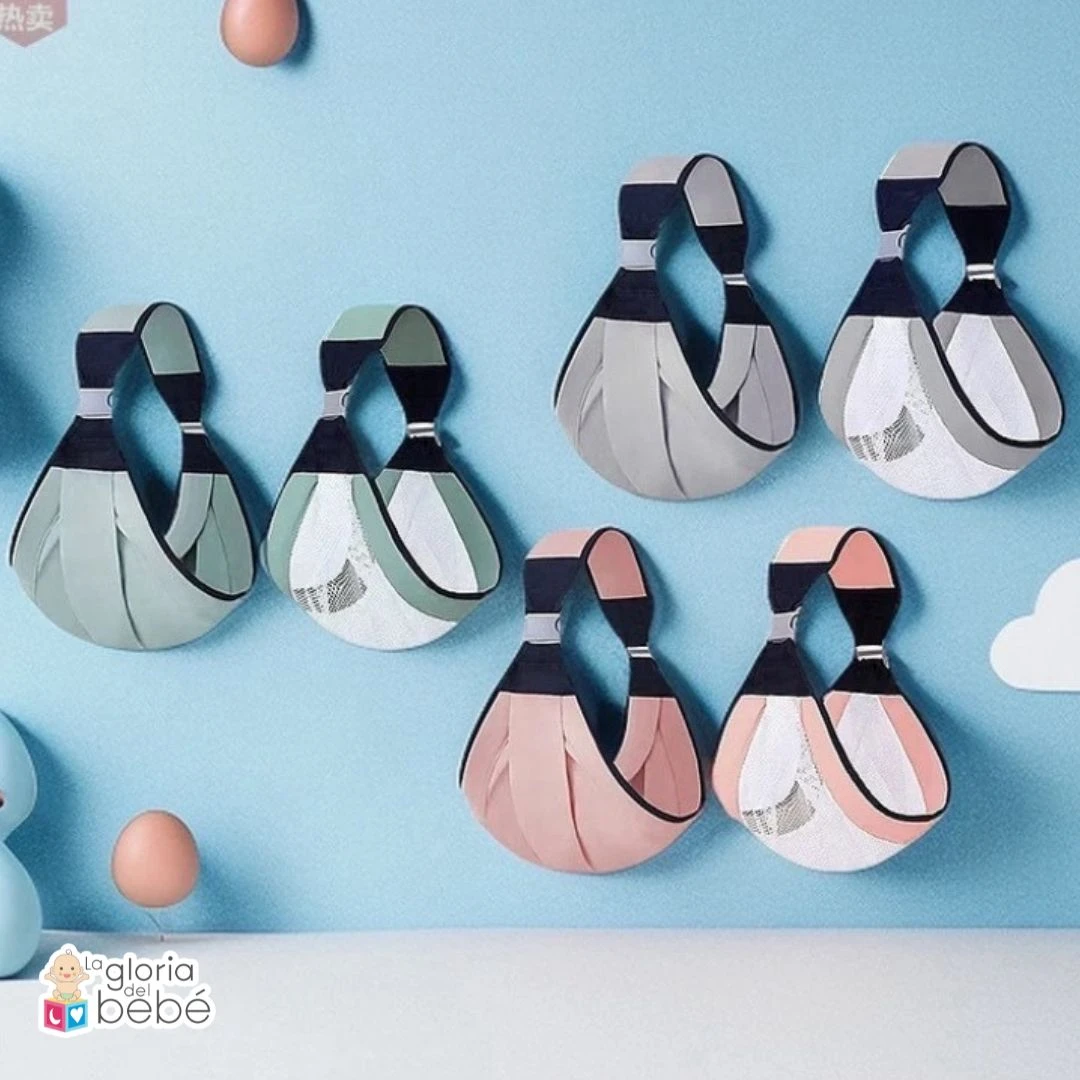 Seis fulares portabebé colgando en la pared en colores pastel y gris.