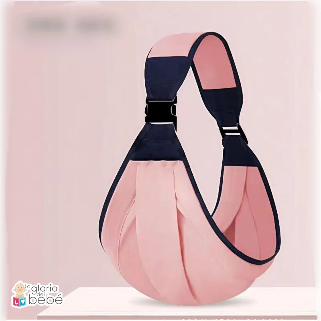 Fular portabebé rosa con detalles azul marino y hebillas negras, ideal para cargar bebés.