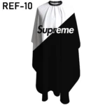 Capa de peluquería negra y blanca, impermeable, con logo "Supreme" y el texto "REF-10".