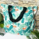 Set x2 bolsa reutilizable Bmcp02 plegable con diseño de flamencos y hojas tropicales, asas negras.