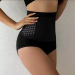 Panty faja control abdomen negro de alta compresión con diseño hexagonal y bandas laterales.