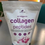 Bolsa de Multi Collagen Peptidos, Vitalcom, polvo para bebida, con florales morados.